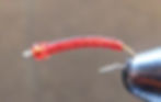 La Pupa with Red Bead