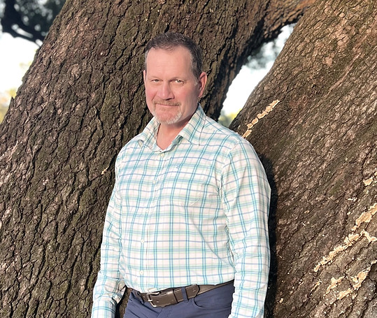 Dr Murphy outdoor by tree_edited_edited.jpg