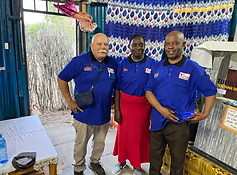 Dan, Prescilla and Patrick at their church.HEIC