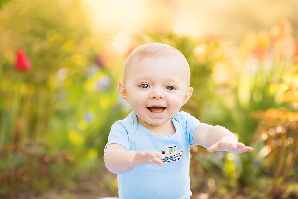 Grosse Pointe baby in flower garden