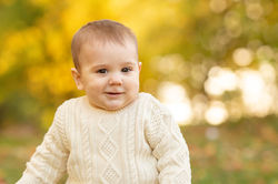Baby boy in fall