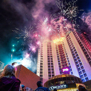 Crowds celebrating New Year’s Eve 2025–2026 on the Las Vegas Strip, surrounded by music, lights, and confetti, showcasing the electric energy that defines the city’s nightlife.