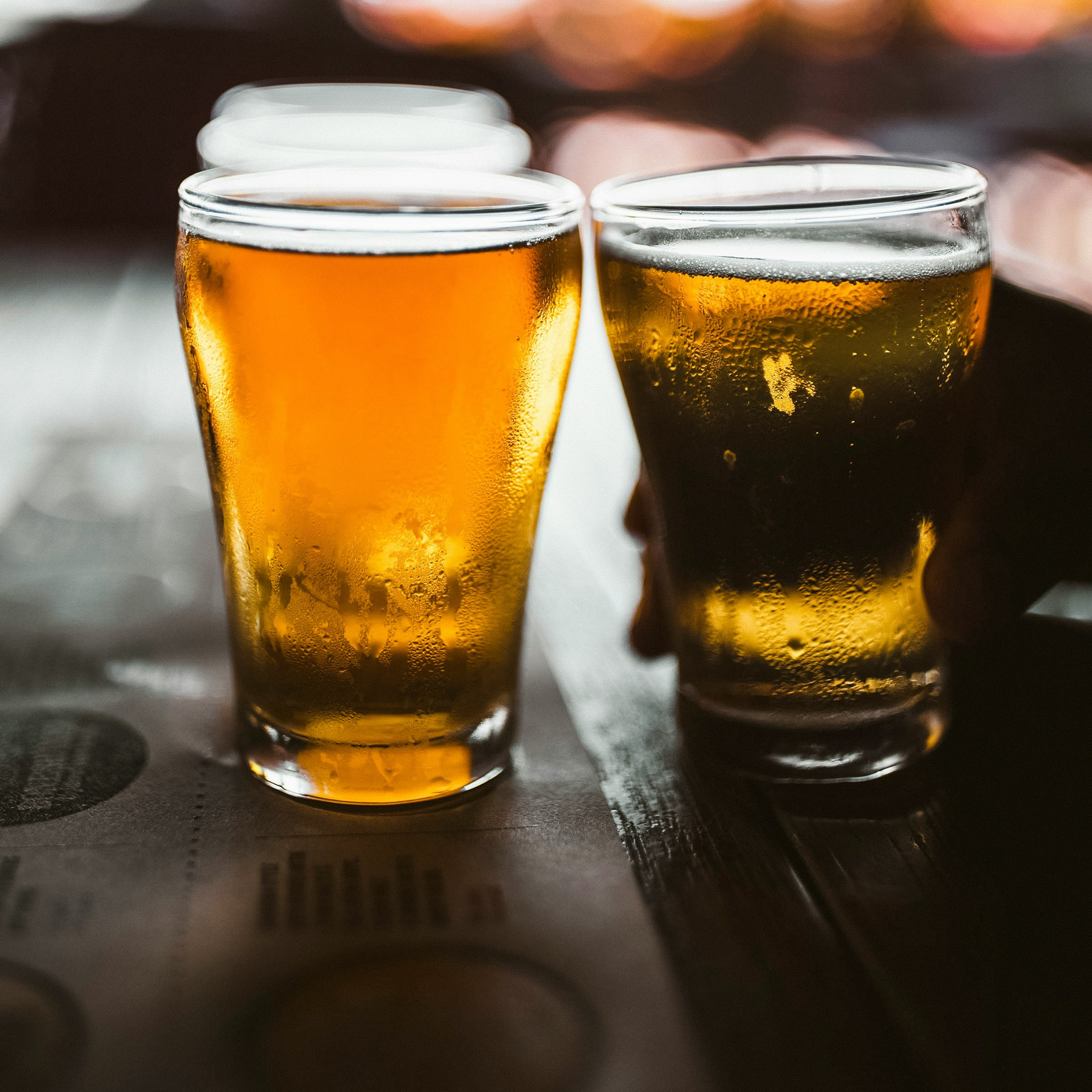 Photo by Teo Do Rio. https://unsplash.com/photos/clear-drinking-glass-with-beer-on-black-table-EUO7L470LXk