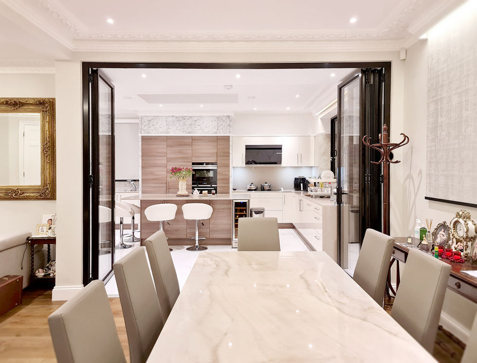 Symphony of Surfaces with Varied Textures in a Sleek Modern Kitchen