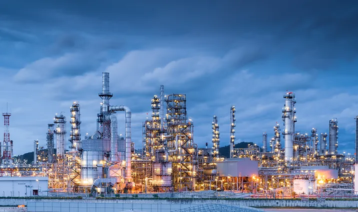 OilGas_Oil refinery plant in the evening.webp