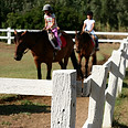 Children Riding Horses