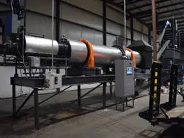 A rotary drum dryer manufactured by Midwest Custom Engineering
