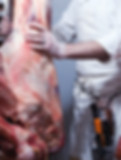 Butcher Hanging Beef