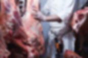 Butcher Hanging Beef