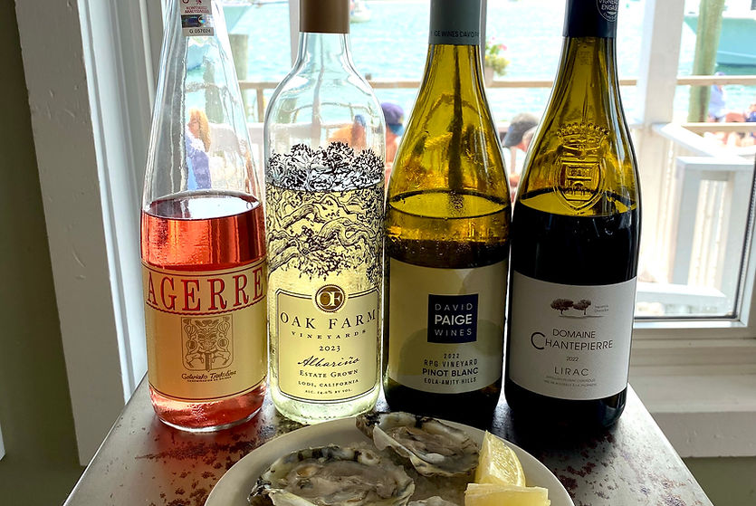 June 2025 featured wines paired with Changing Tide Oyster Co. "South River Salts"