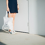 Girl with Tote Bag