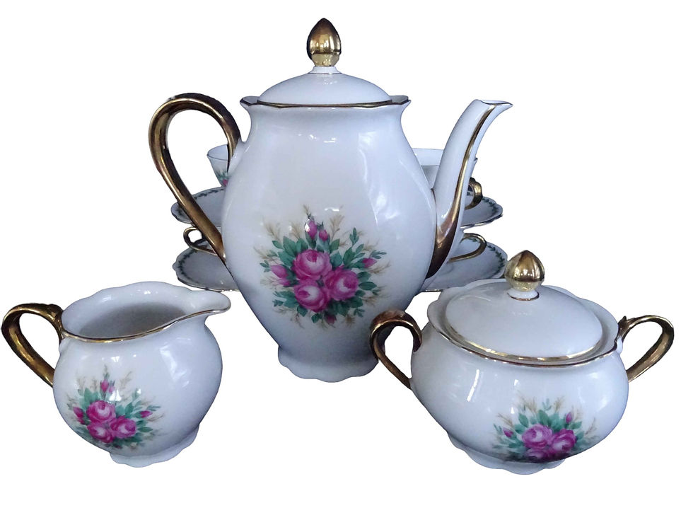 Miniature : 6 tasses, 1 crémier, 1 sucrier, 1 cafetière en porcelaine