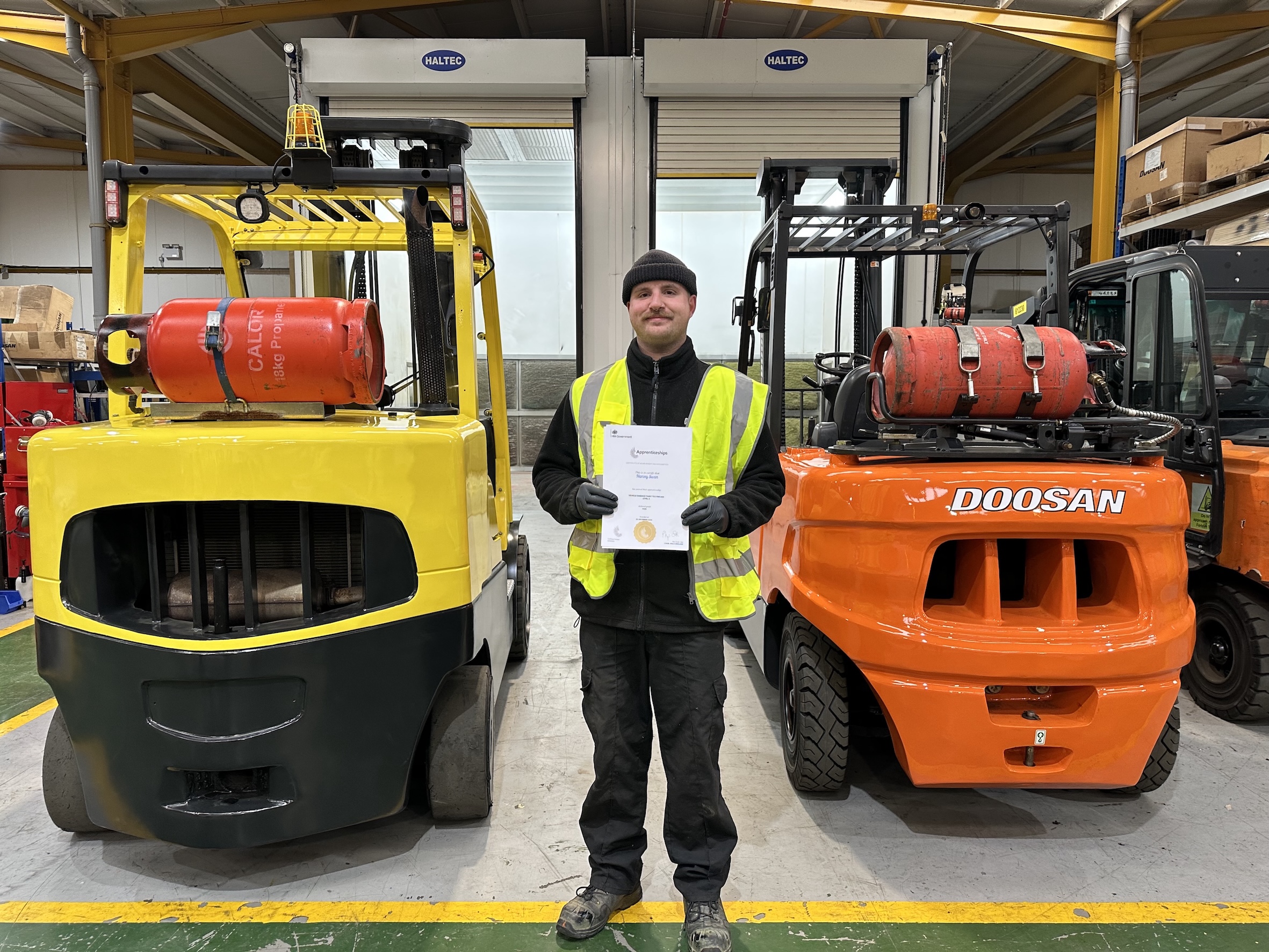 Harvey Swan is a fully qualified Level 3 Vehicle Damage Paint Technician who completed a two-year apprenticeship with materials handling services company Rushlift