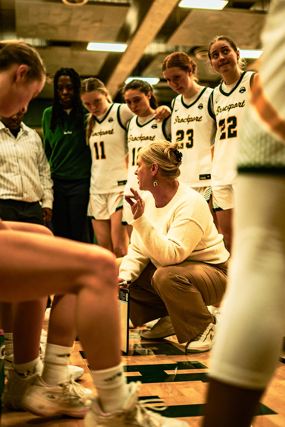 The No. 2 Brockport Golden Eagles and Head Coach Corinne Jones in the huddle during the Empire 8 quarterfinals hosting No. 7 Elmira. (Photo: Ryan Tezak)