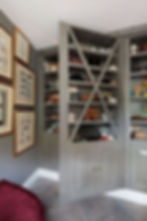 The client loved the hidden door in the bookcase