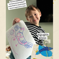 дитина з малюнком птаха