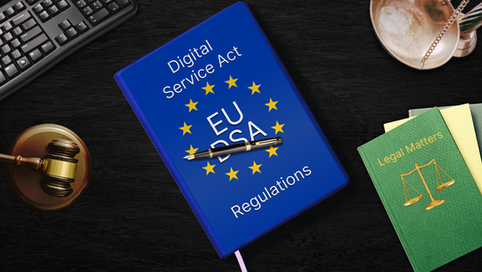 A blue notebook labeled 'EU Digital Services Act (DSA) Regulations' with a fountain pen resting on it, surrounded by legal-themed books, a gavel, a keyboard, and a cup on a dark wooden desk. Represents online regulations, freelancer compliance, and legal implications of the EU DSA.