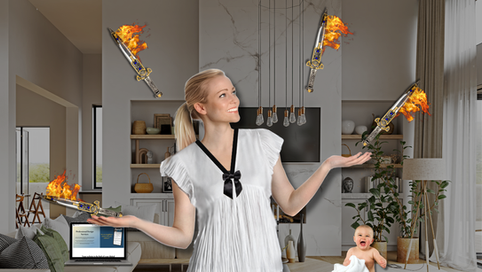 Woman in a white dress juggles flaming swords in a modern living room. A baby smiles nearby. A laptop on the sofa shows text.