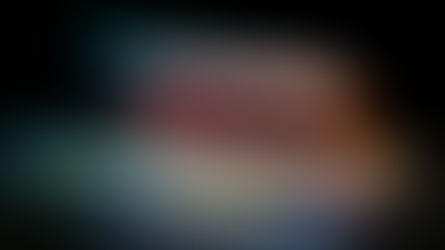 Partially open laptop glowing in the dark with the text “A Great Website Isn’t Bought — It’s Built,” symbolizing how thoughtful design and customization transform a basic template into a unique brand website.