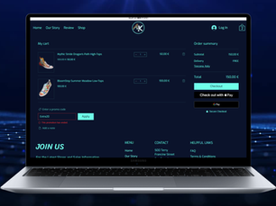 Laptop screen with online shopping cart displaying two pairs of shoes. Dark blue background, visible checkout payment options, and promo code section.