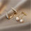 Thumbnail: Pearl Dangle Earrings