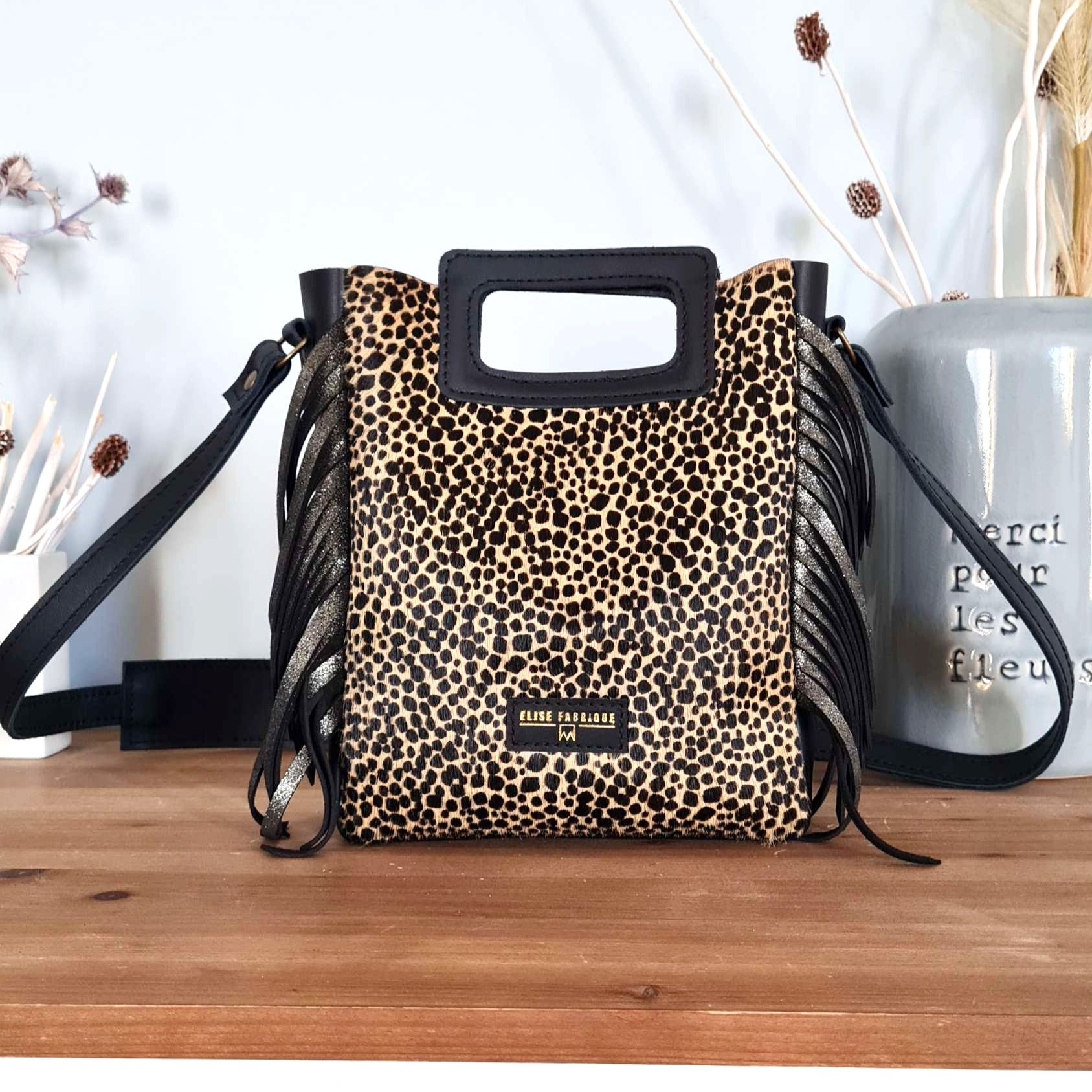 Dandy guépard noir et brillant 