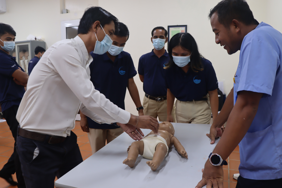 A dedicated infant manikin was used to demonstrate proper hand placement and technique for infant CPR