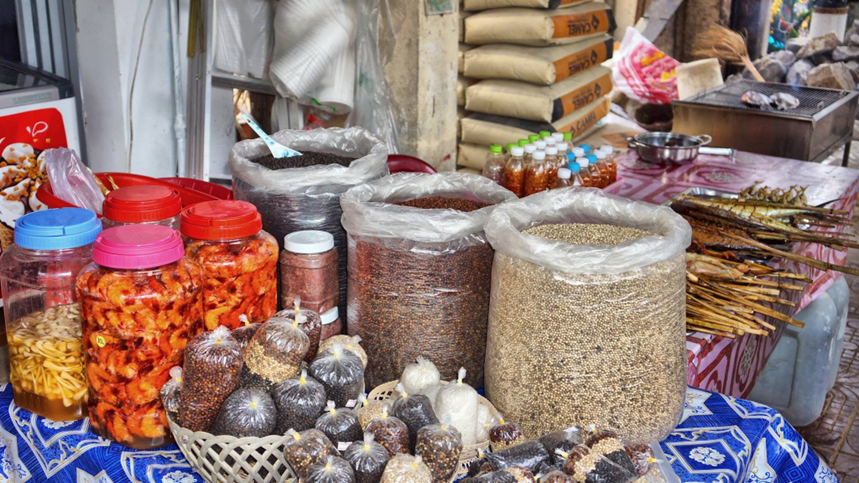 Jars of marinated dried shrimp, sacks of Kampot pepper and skewers of smoked fish line the stalls neighbouring the market.