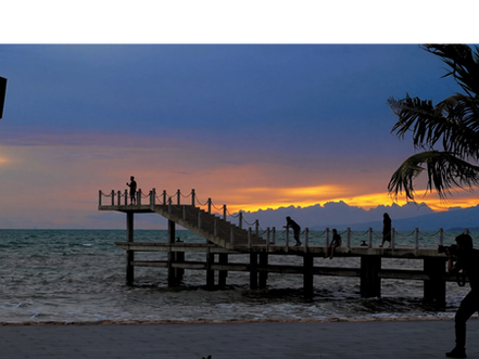 You must see it at least once. Not in a photo, not on a screen — for real, standing there facing the gulf, with the monsoon wind pushing clouds across the sky like it has somewhere to be. Kep in green season is not the Kep of postcards. It's better than that.