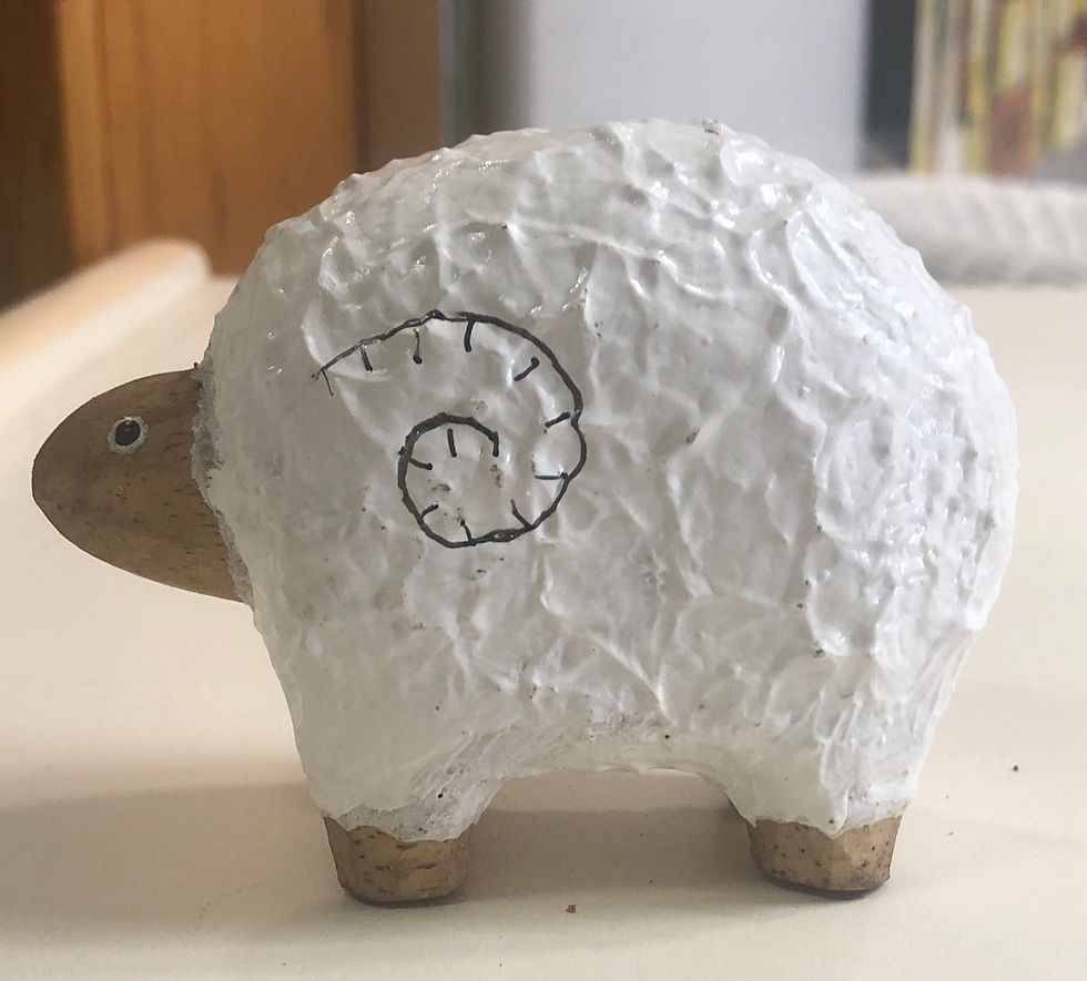small ram statue wood