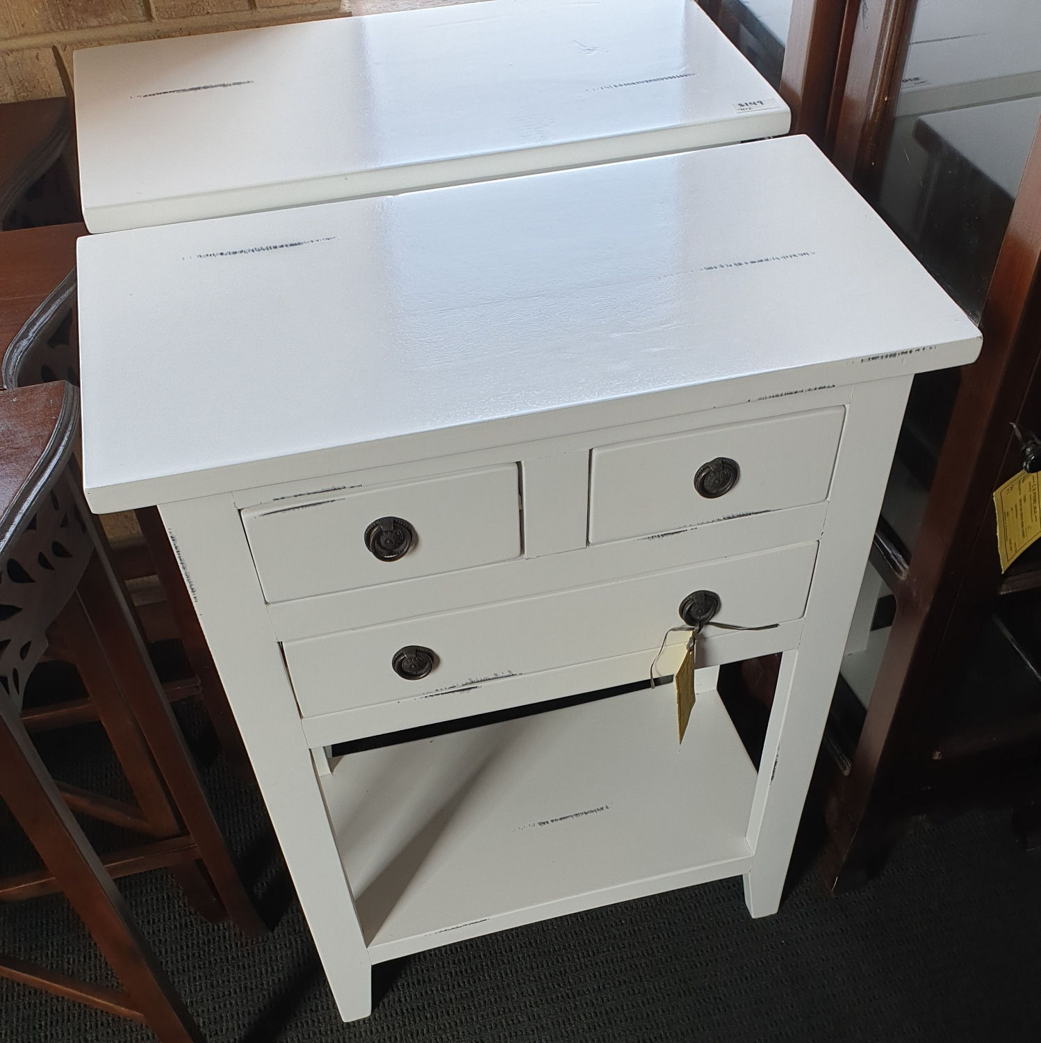 Distressed white side table