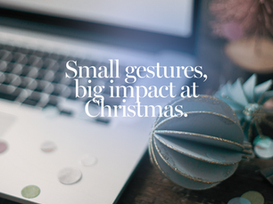 A festive desk scene with a laptop, Christmas decorations and confetti, featuring the text “Small gestures, big impact at Christmas.