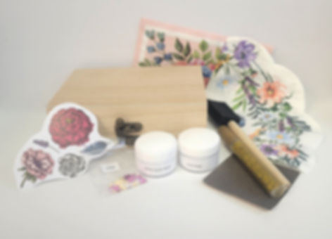 Decoupage Trinket Box Craft Kit with contents (brushes, mod podge, and decorative stickers, etc) on display