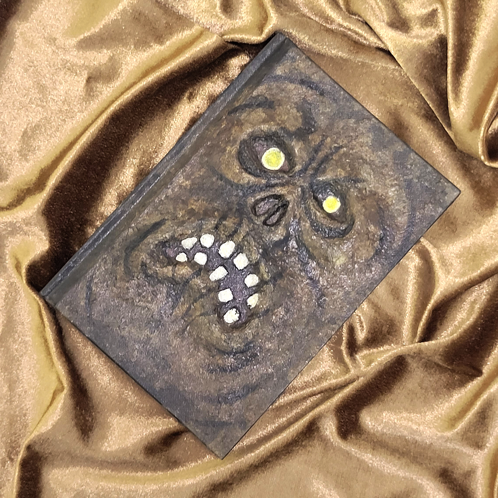 Thumbnail: Handmade Necronomicon Journal Cover, on brown velvet bg