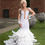 Thumbnail: Beaded feather prom dress 