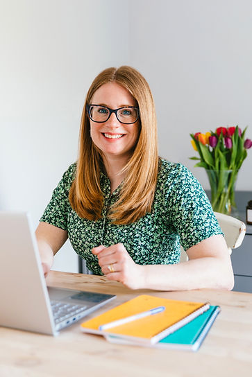 Head shot with laptop green.jpg