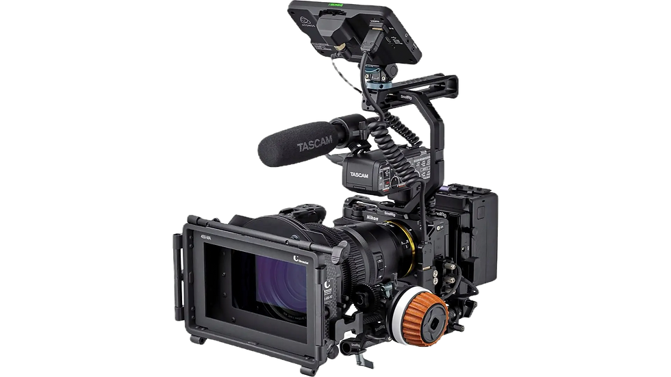 Professional video camera rig with a microphone and monitor, set against a textured black background. Labels include "TASCAM" and "Nikon." dressed up with lipstick.