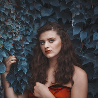 fantasy girl surrounded by blue vines