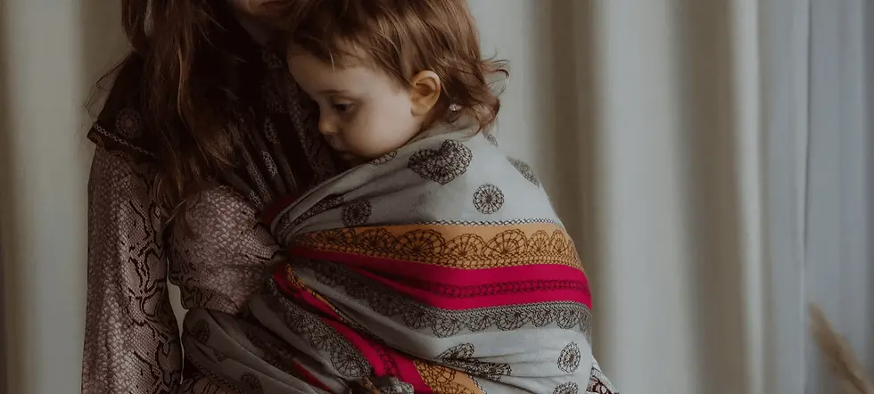 Emma, qualified babywearing consultant in Hastings, offering sling hire and 1-to-1 support across East Sussex.