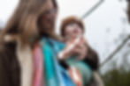 Mum carrying her baby in a ring sling