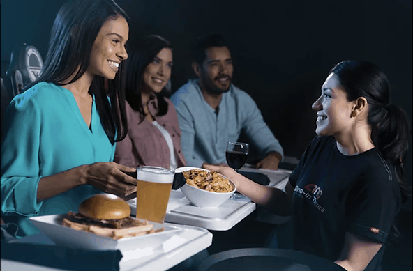 Friends having dinner at AMC movie theater