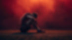 Football player sitting on ground after mistake, head down, dramatic cinematic lighting..j