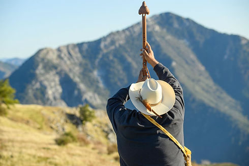 Esselen Tribal Lands Conservation Project-Chairman Raising Staff to the Hills.jpg