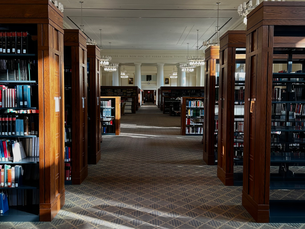 Inside of Harvard Law School Library with bookshelves