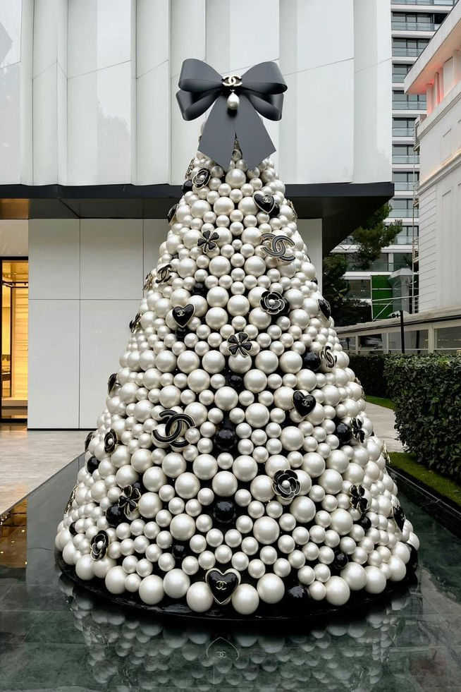 Black and white Chanel designer Christmas tree with black and white ornaments
