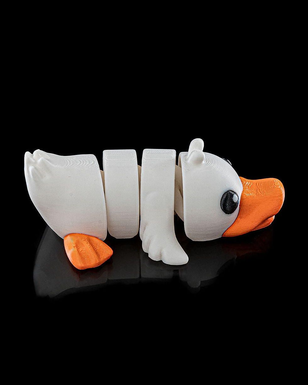 Miniaturbild: Flexi Duck Anhänger von vorne – bewegliche Ente als Taschen-Anhänger