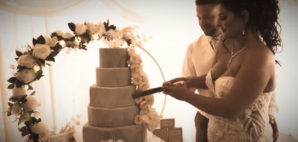 Bride and Groom cutting their Nanny Sam's Cakes wedding cake