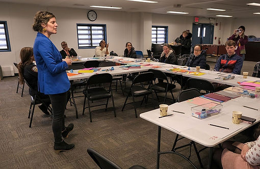 Sharon Itkoff Nacache speaking at a workshop