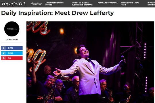 Drew Lafferty in front of a big band features on Voyage ATL interview article.