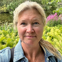 Kelly head shot 2025.jpeg